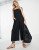ASOS DESIGN cami minimal pocket jumpsuit in black – Sale